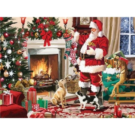 Santa claus playing with puppy and kitten